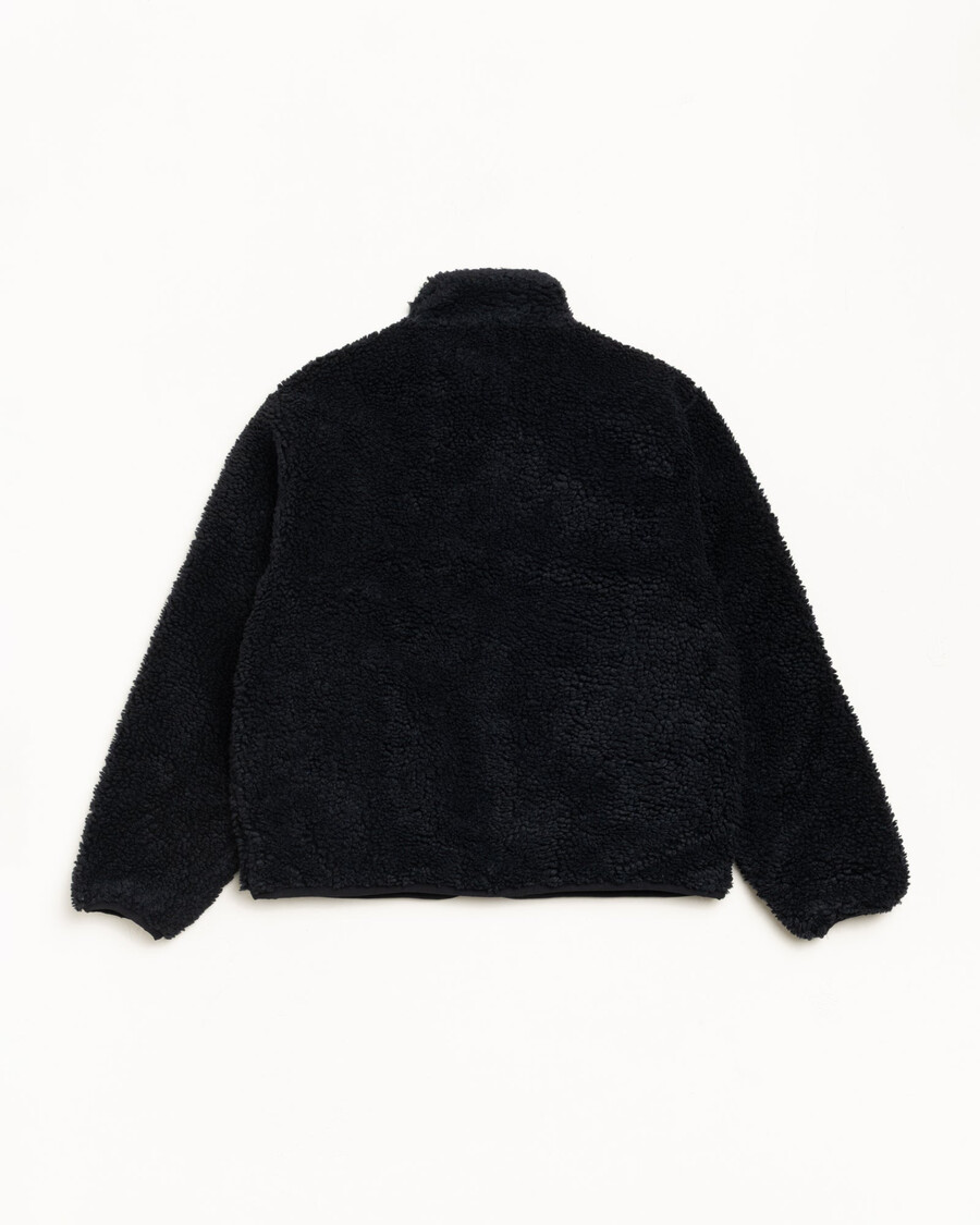 chaqueta reversible sherpa en negro