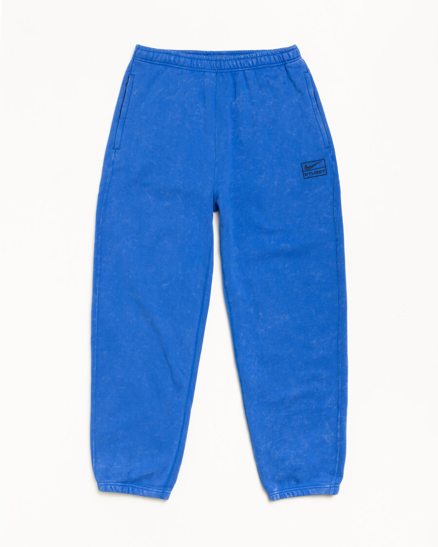pantalón de polar con lavado ácido de stüssy nike